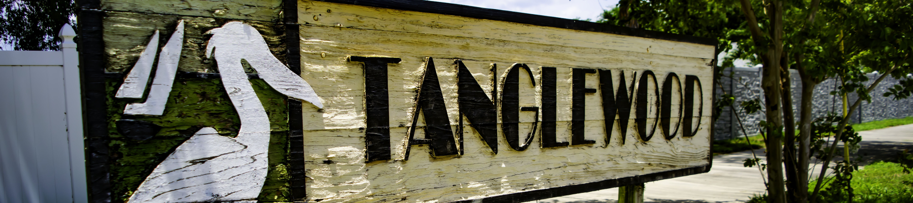 Wooden sign with pelican in tanglewood st petersburg